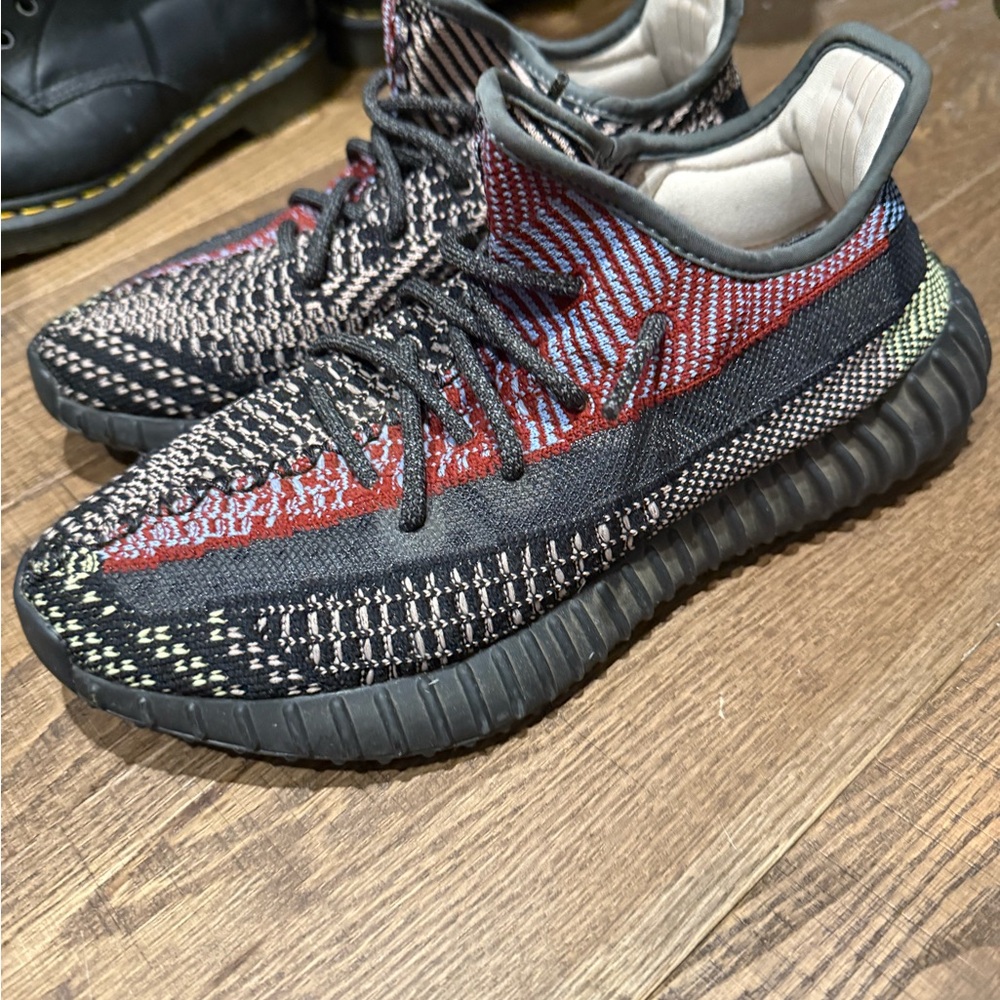 Yeezy Red and Black Sneakers with Boost Cushioning